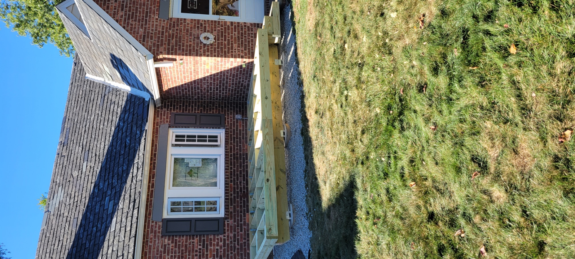 Deck building crew working on framing